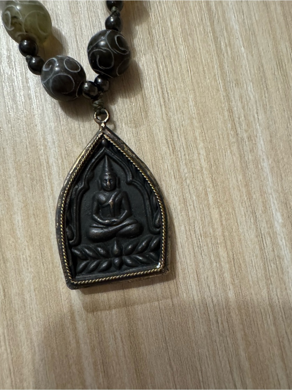 Black Buddha Pendant Necklace with Bronze Trim